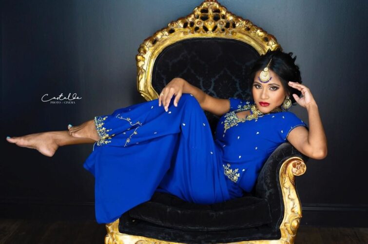 Indian Bride Relaxing on a Luxury Chair after Luxury Makeup by Kristy's Artistry Design Team