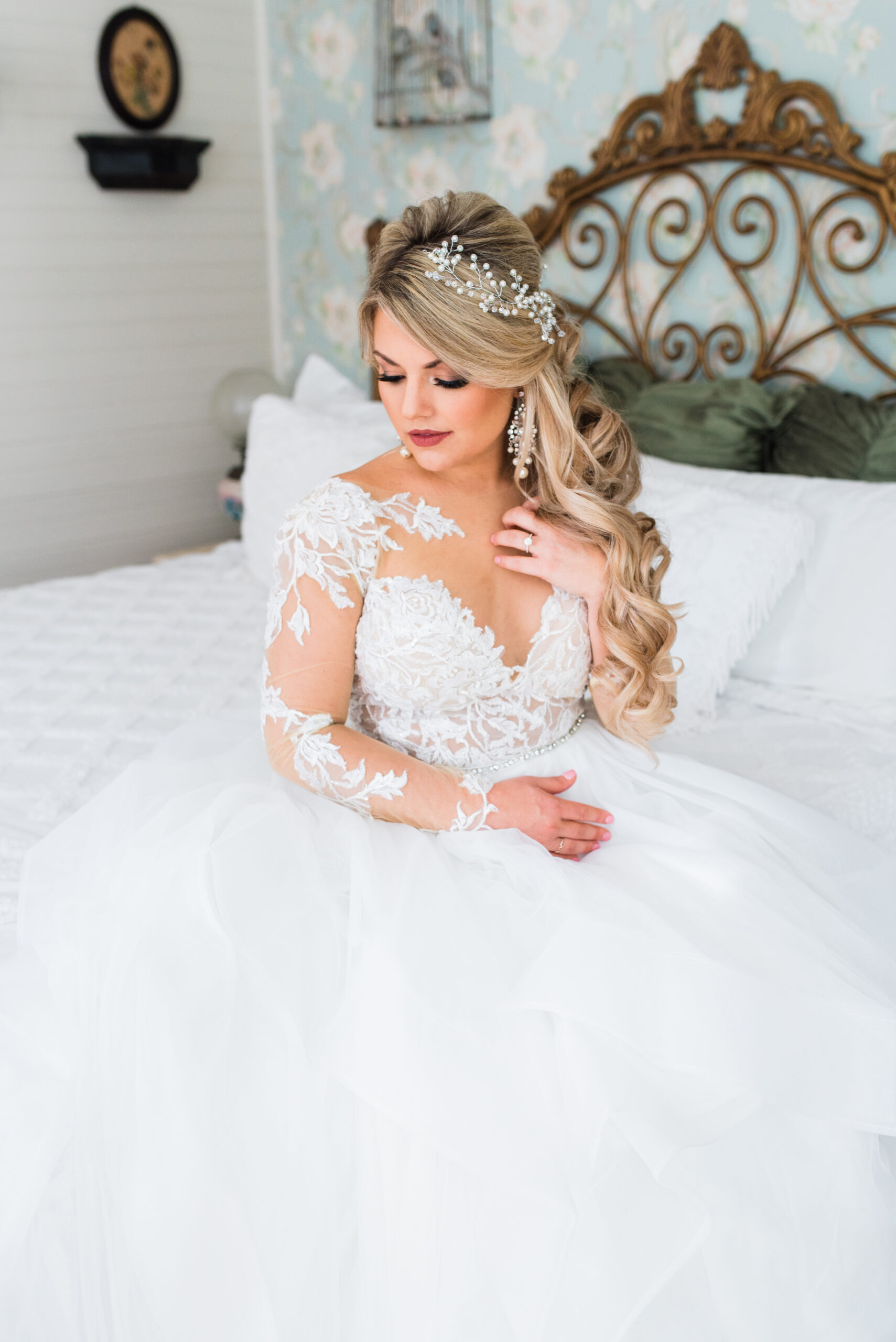 Bride with luxurious makeup and hair, wearing a tiara by Kristy's Artistry Design Team