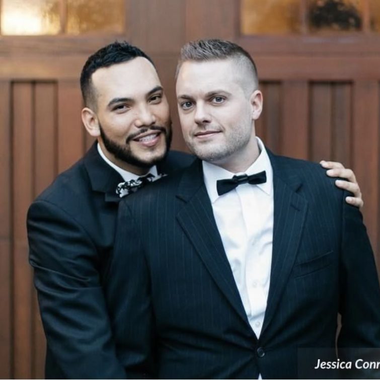 LGBTQ Couple Embracing for Perfect Couples Photo - Makeup by Kristy's Artistry Design Team