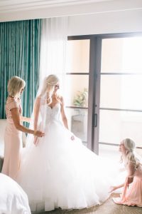 Bride in Wedding Dress by Window