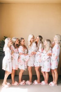 Bride and Bridesmaids in Bathrobes - After Hair and Makeup by Kristy's Artistry Design Team