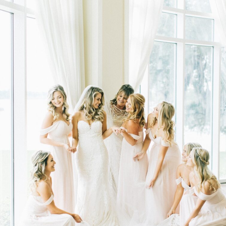 Bride and Bridesmaids in Perfect Lighting by wedding hair and makeup Kristy's Artistry Design Team