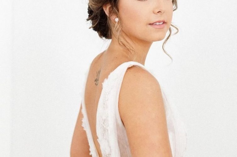 Bride Looking Back: Classic Wedding Makeup by Kristy's Artistry Design Team