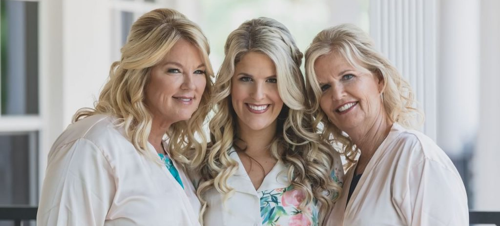 Bride, Mother, and Mother-in-Law with stunning hair and makeup at Kristy's Artistry Design Team