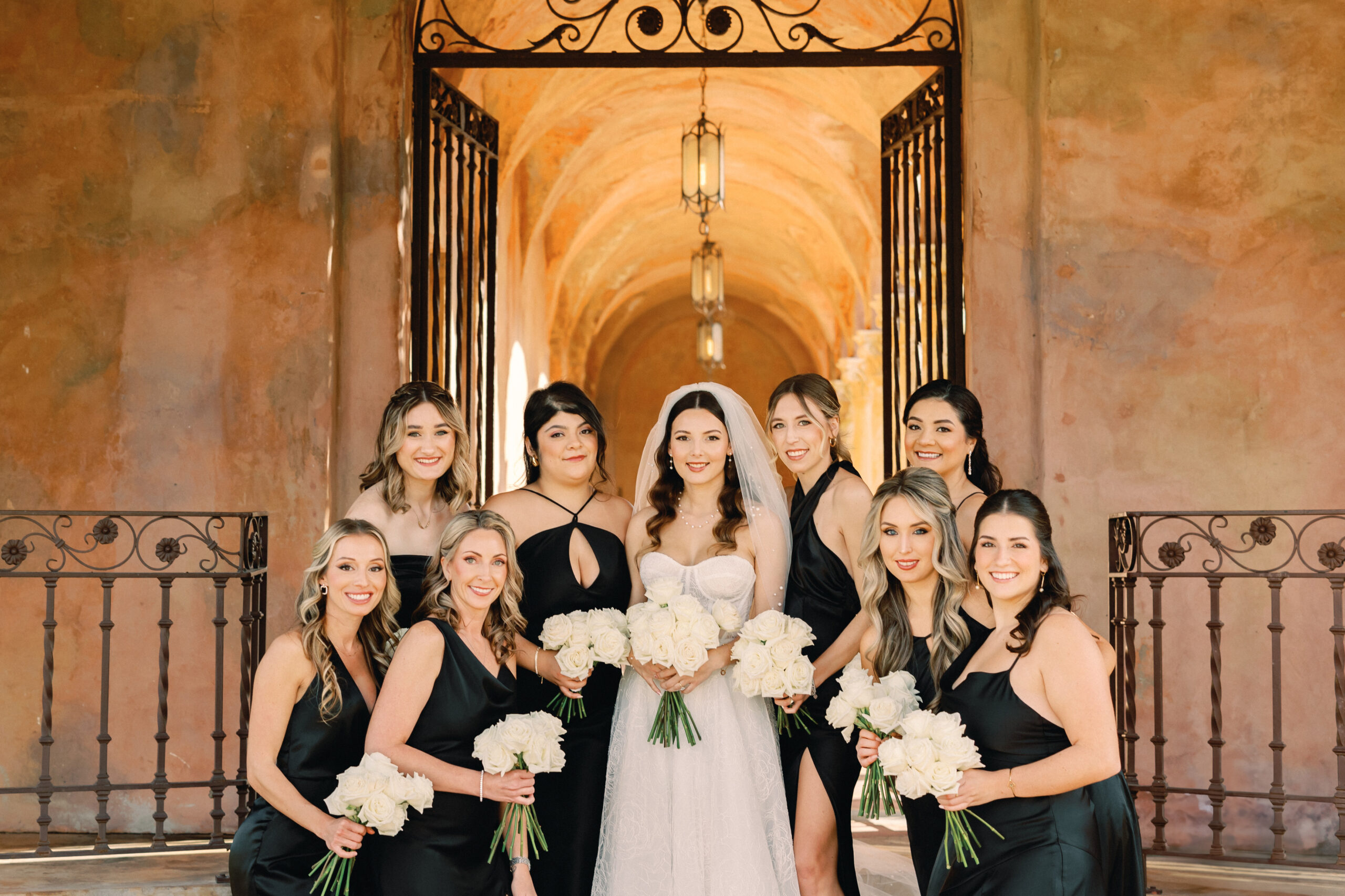 Bride and bridal party of 8 Bridesmaids with Makeup by the hair and makeup artists at Kristy's Artistry Design Team in Orlando FL