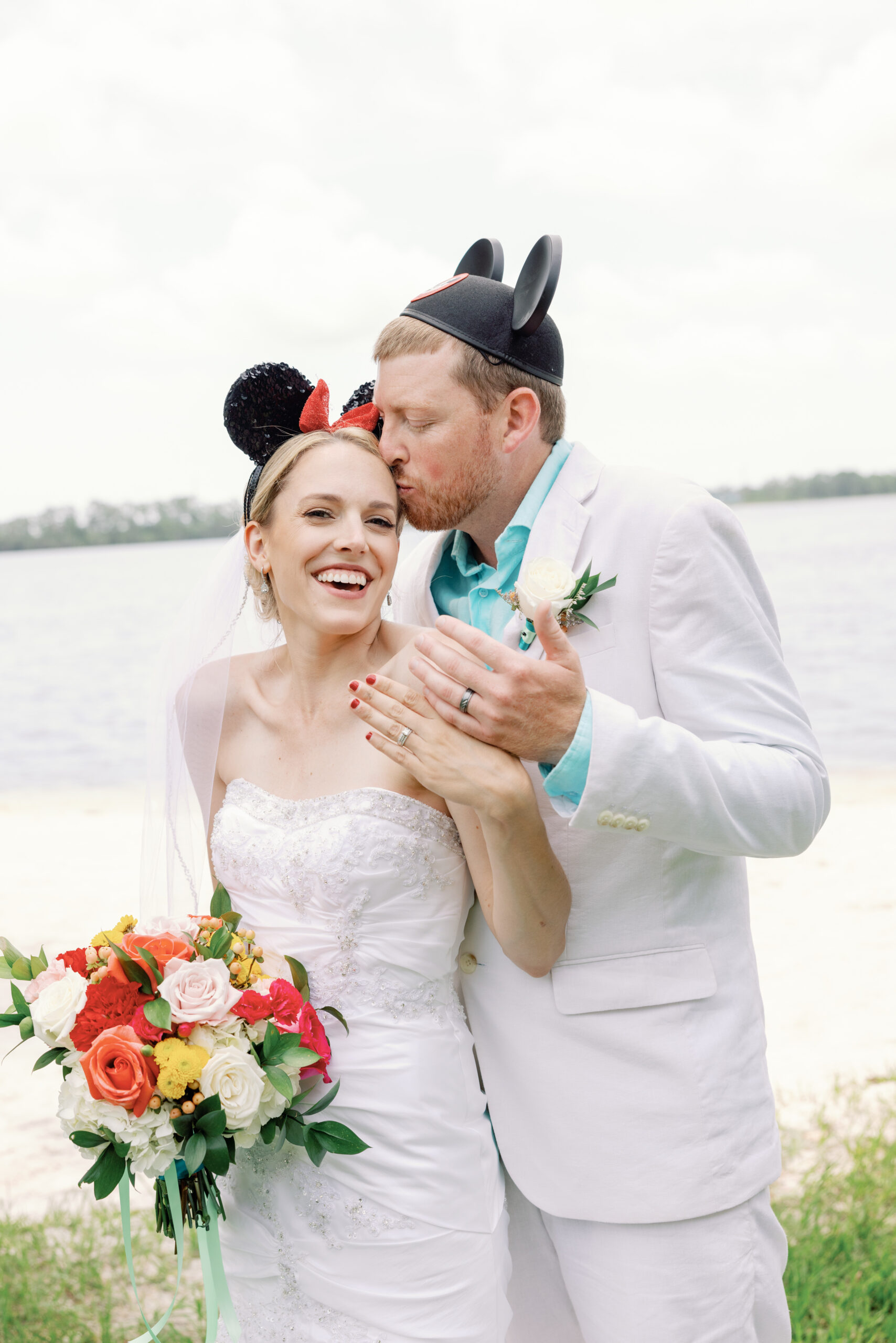 Disney wedding hair and makeup for a bride done by Kristy's Artistry Design Team, the best mobile hair and makeup team in Orlando.