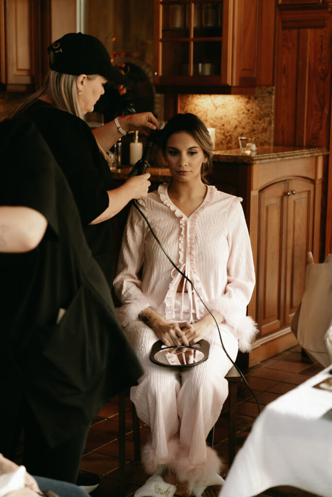 Kristy's Artistry Design Team doing wedding hair and makeup
