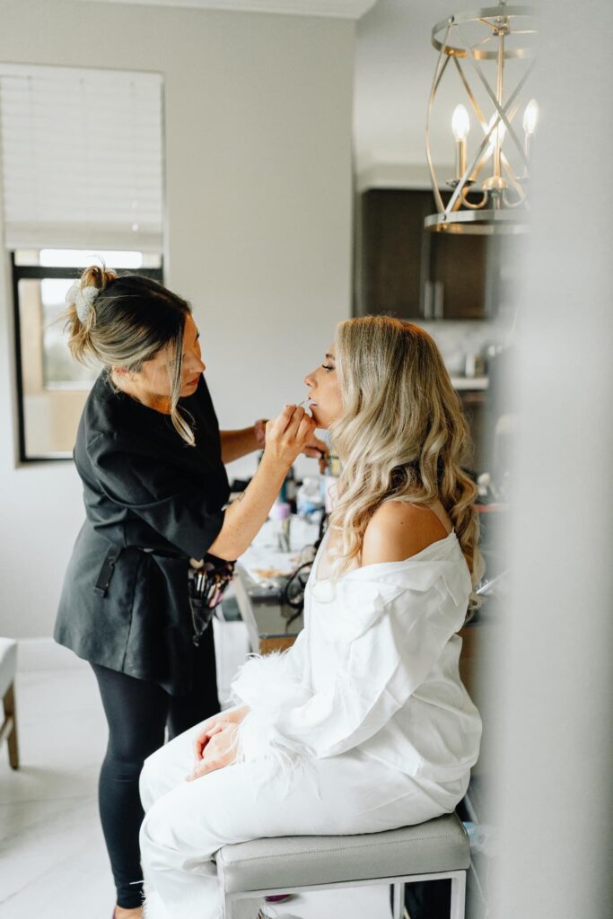 Kristy's Artistry Design Team does camera ready makeup