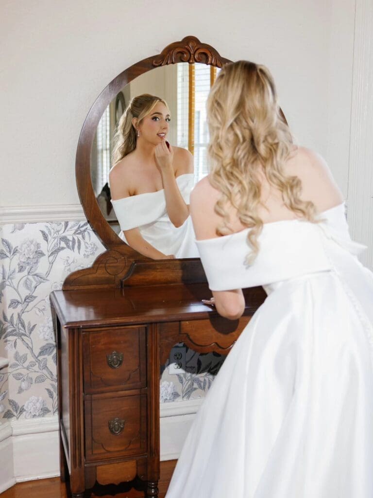 The Highland Manor's bridal suite with Kristy's Artistry Design Team's bride's final touches for her wedding day hair and makeup.
