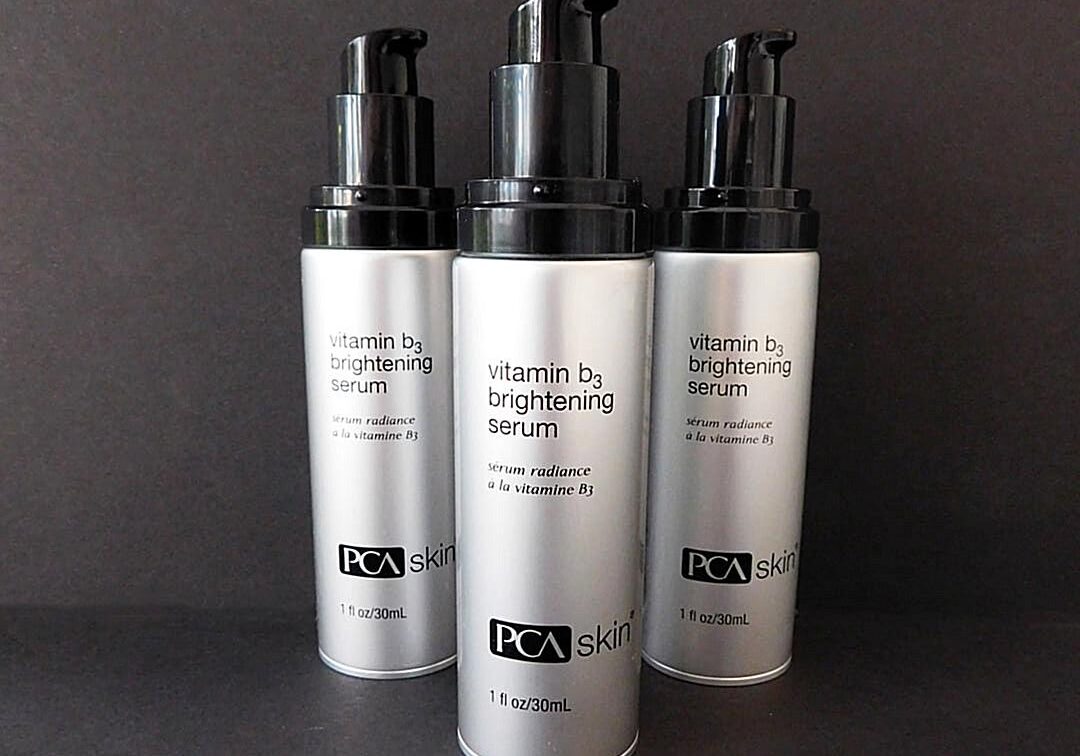 Three bottles of Vitamin B3 brightening serum.